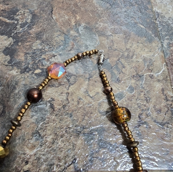 copper colored beaded necklace with orange beads - Picture 4 of 5
